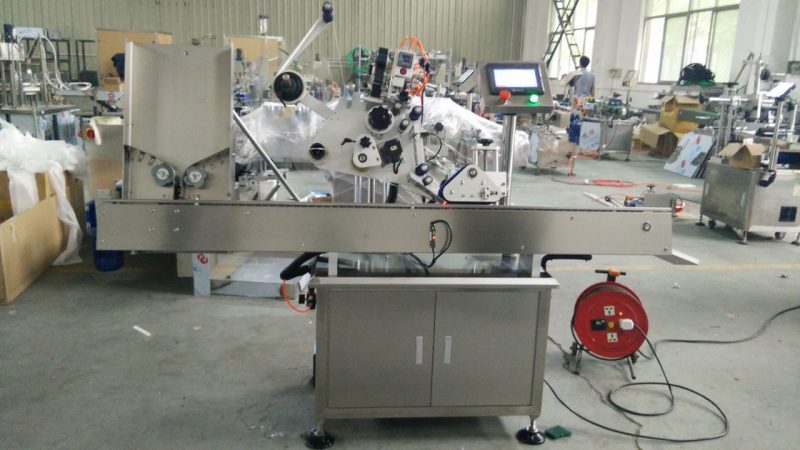 중국 접착 성 기계, 눈 화장품을위한 까만 병 상표 스티커 기계가 고속 작은 둥근 깡통에 의하여 레테르를 붙입니다 협력 업체